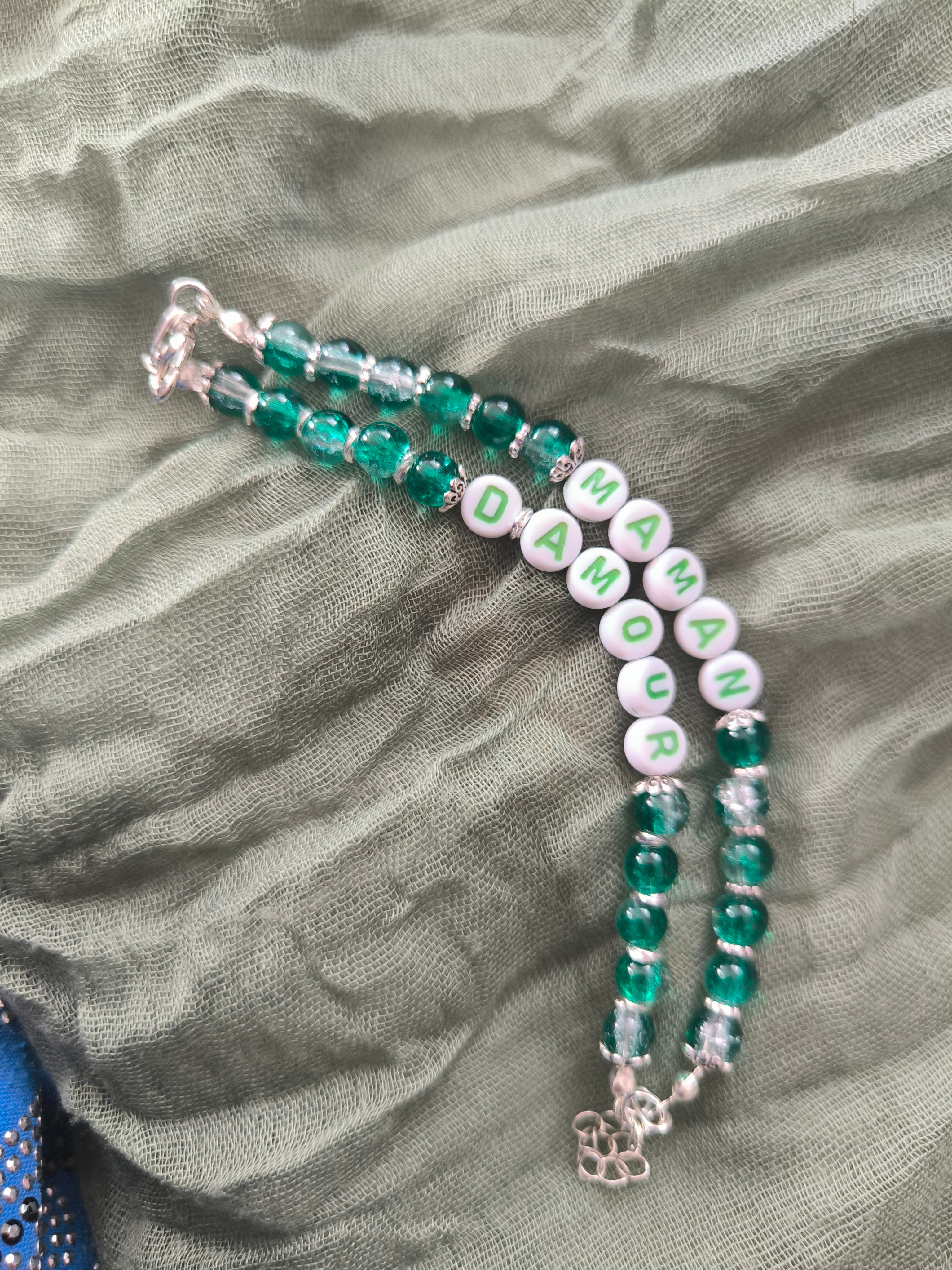 Bracelet double en perles de verre , acier inoxydable et perles en plastiques