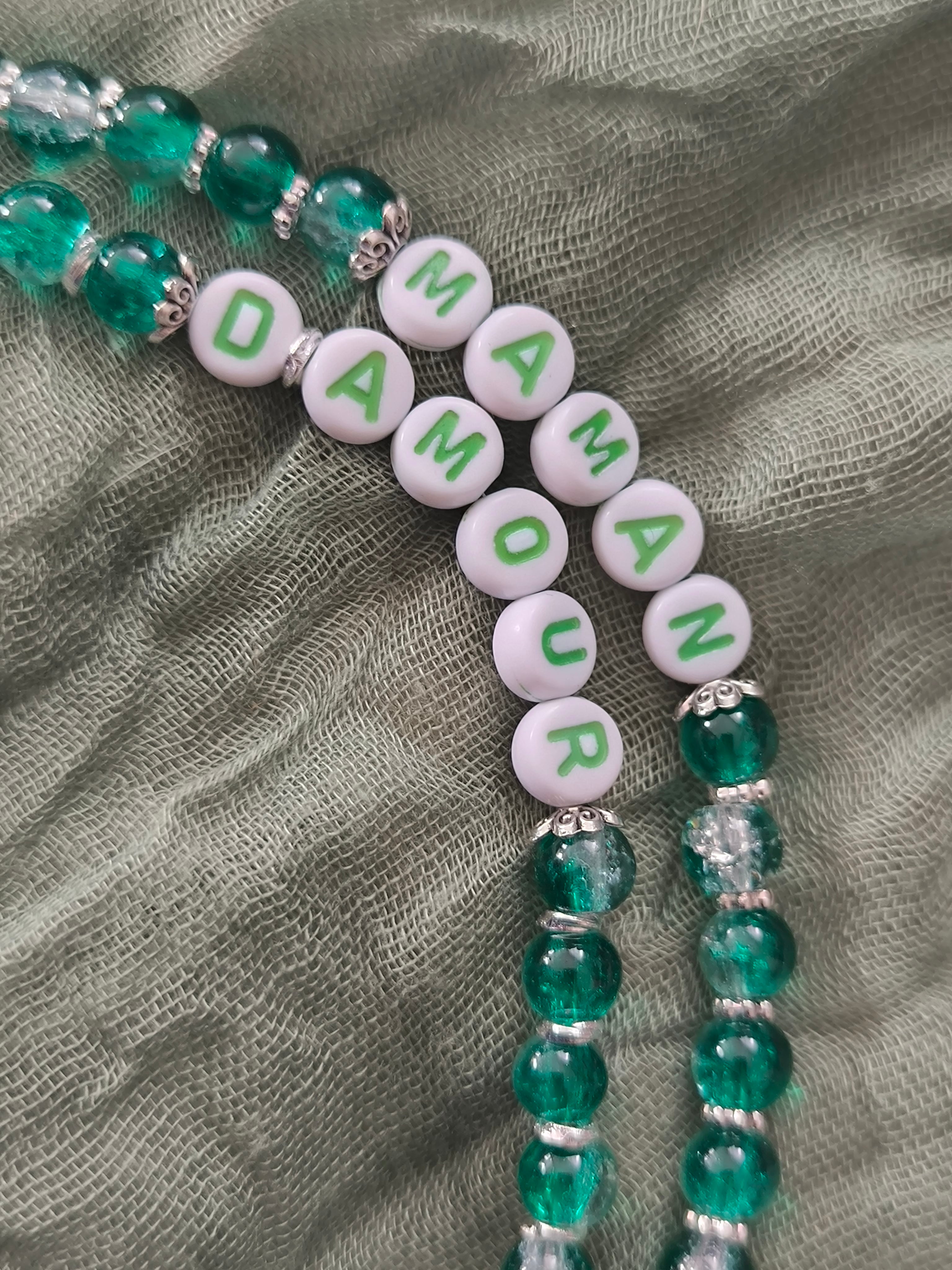 Bracelet double en perles de verre , acier inoxydable et perles en plastiques